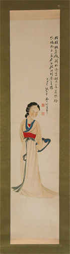 A CHINESE FIGURE SCROLL PAINTING OF A LADY