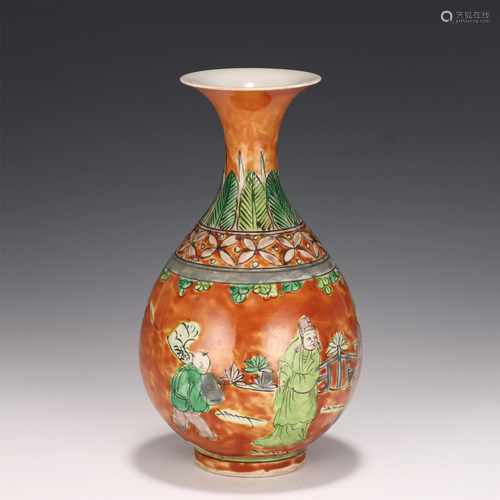 A CHINESE YELLOW GROUND FIGURAL PORCELAIN VASE