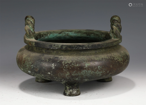 A CHINESE BRONZE TRIPOD CENSER WITH DOUBLE HANDLES