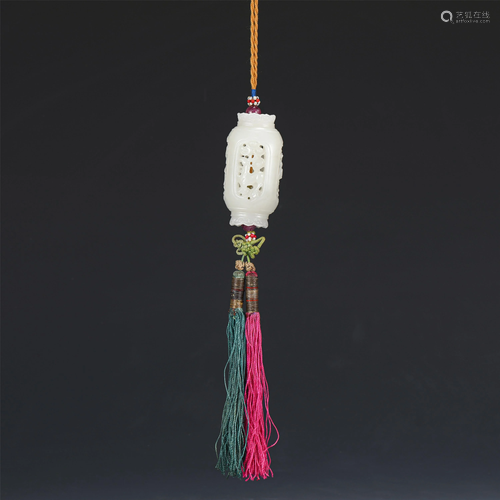 A CHINESE HOLLOW CARVED JADE INCENSE CAGE PENDANT