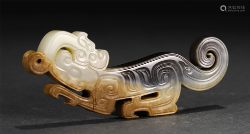 A CHINESE ARCHAISTIC JADE CARVING