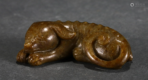 A CHINESE JADE CARVED MYTHICAL BEAST