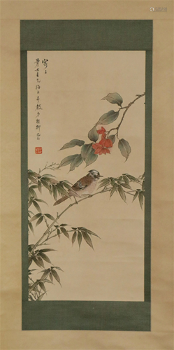 A CHINESE SCROLL PAINTING OF FLOWER AND BIRD