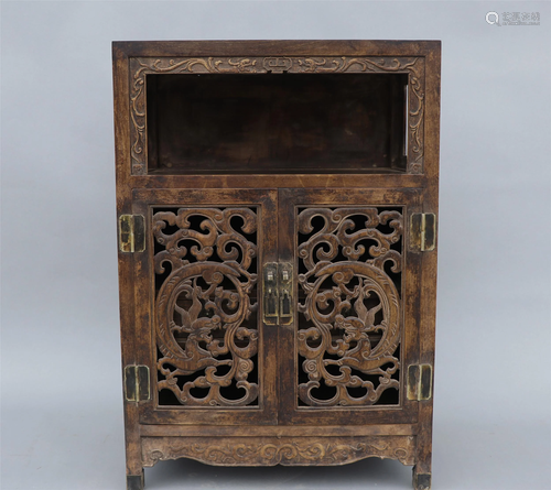 A CHINESE HUANGHUALI WOOD CORNER CABINET