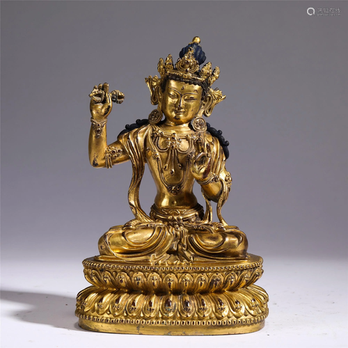 A CHINESE GILT BRONZE SEATED FIGURE OF BUDDHA