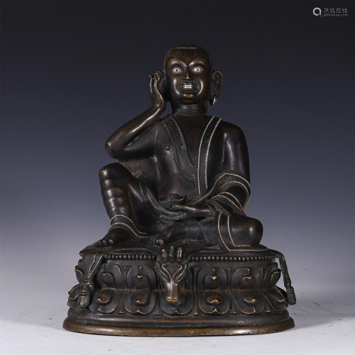 A CHINESE BRONZE SEATED FIGURE OF FORTUNE GOD
