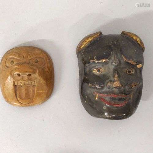 JAPON. LOT de deux MASQUES Nô en terre cuite vernissée et bo...