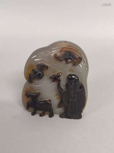 CHINE. Sujet en AGATE sculptée et incisée représentant en ba...