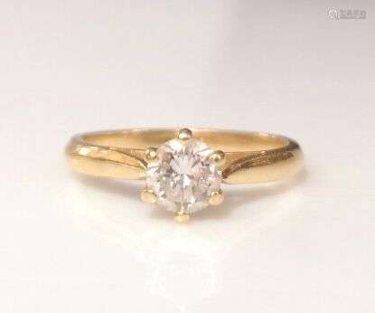 Bague solitaire en or sertie d'un diamant taille brillant pe...