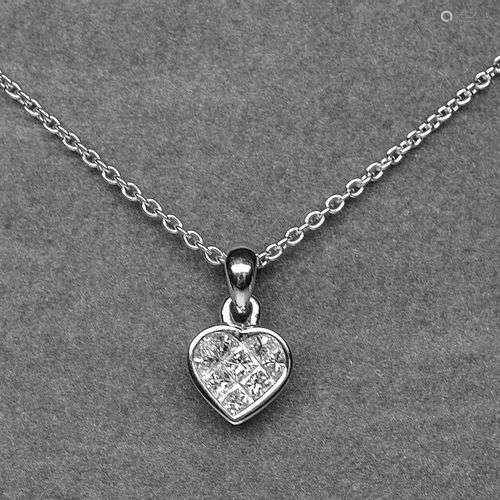 Pendentif coeur serti de 8 diamants princes en serti invisib...