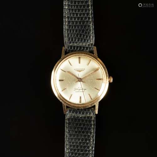 LONGINES. Bracelet-montre d'homme en or modèle Flagship, cad...