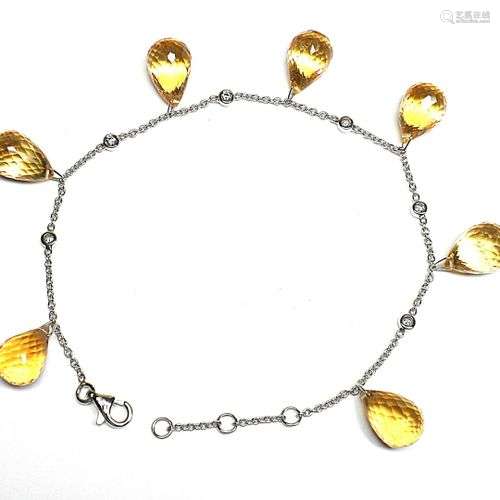 Bracelet en or blanc orné par 7 citrines briolétées pour 35 ...