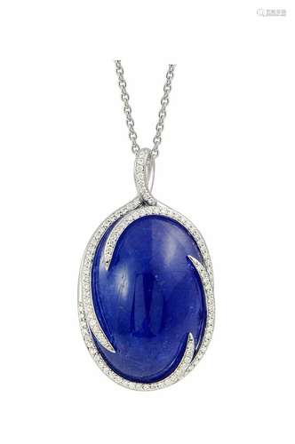 Pendentif en or blanc centré d'une très importante tanzanite...