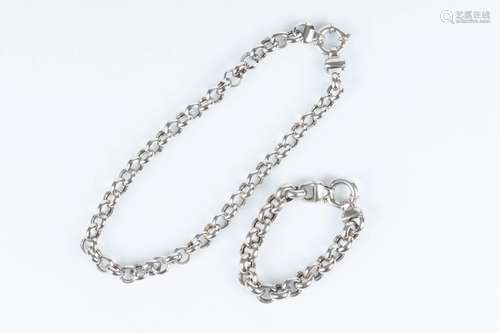 Collier et bracelet à maille ronde en argent, fermoirs bouée...