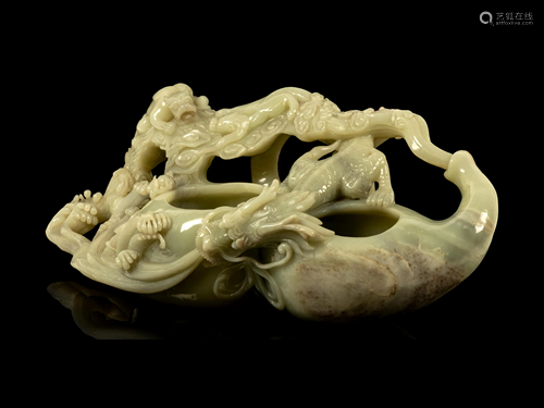 A Large Chinese Celadon Jade 'Dragon on Gourd' Brush