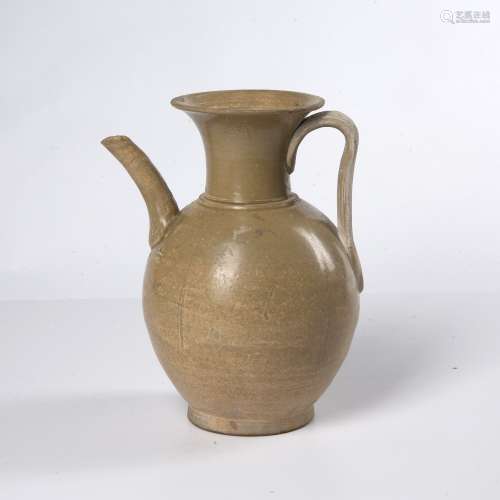 Glazed ewer Chinese, Tang of simple form with an elongated l...
