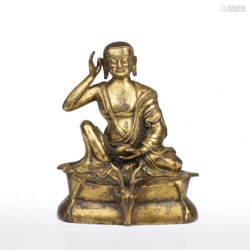 Gilt bronze seated buddha Sino-Tibetan with right hand raise...