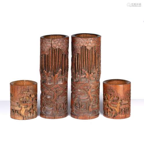 Two pairs of bamboo brush pots Chinese each carved with scho...