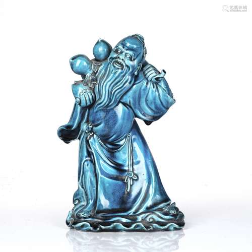 Turquoise glazed Lohan Chinese, 18th/19th Century the slight...