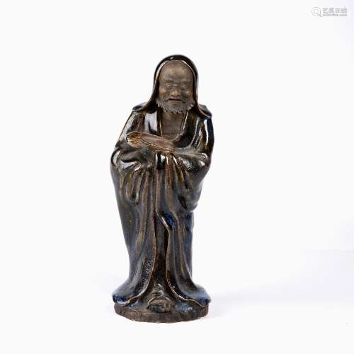 Glazed stoneware model of a Lohan Chinese the standing figur...