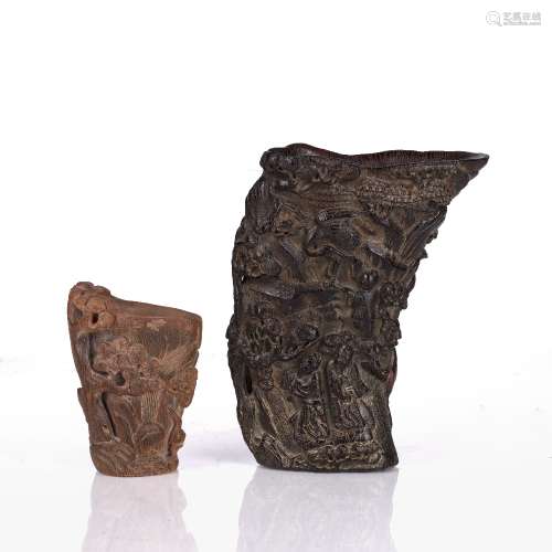 Two carved libation cups Chinese the largest carved with sch...