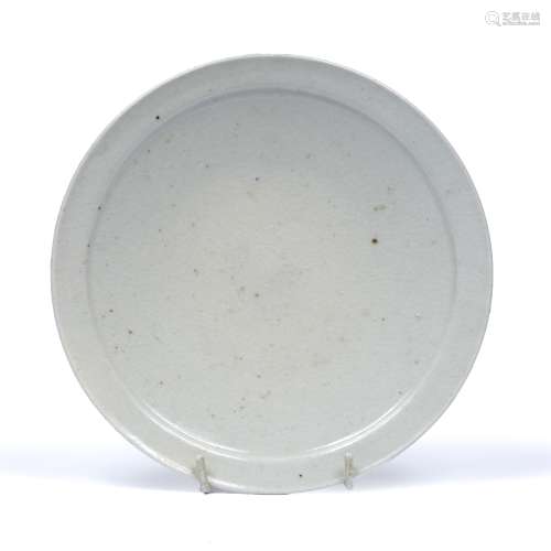 White glaze dish Korean, 16th Century finished with a raised...