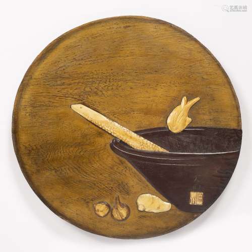 Round wooden plaque Japanese, 20th Century depicting a woven...