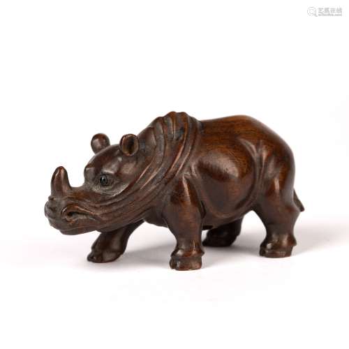 Contemporary wooden netsuke Japanese depicting a standing rh...