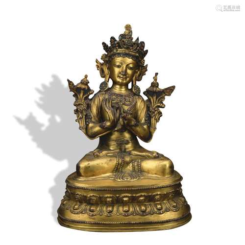 A gilt-bronze figure of Manjusri