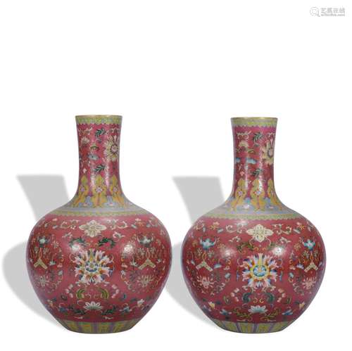 A pair of red ground famille-rose 'floral' globular vase