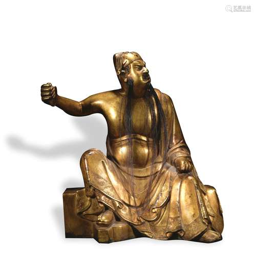 A gilt-bronze statue of Guangong