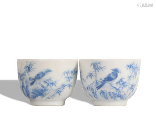 A pair of blue and white 'floral and birds' cup