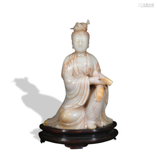 A shou shan stone statue of Guan Yin