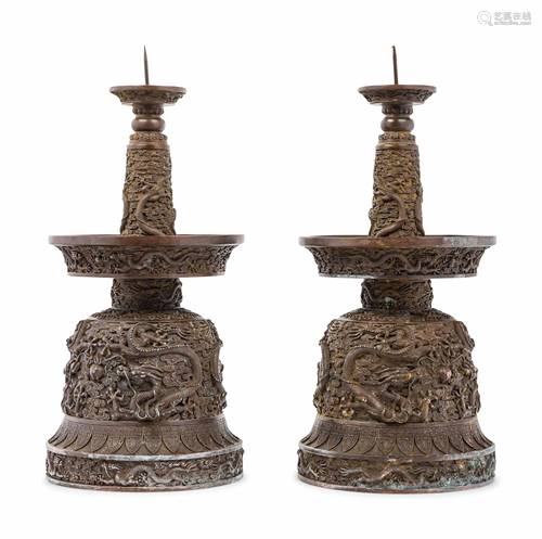 A Pair of Chinese Bronze Candle Holders