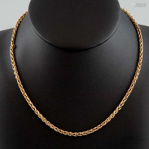 Collier en or jaune 18K 750°. Poids 18,5g.