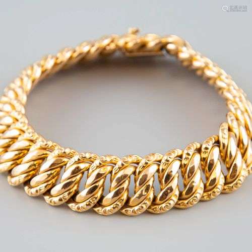 Bracelet articulé en or jaune 18K 750°. Poids 30,2g.