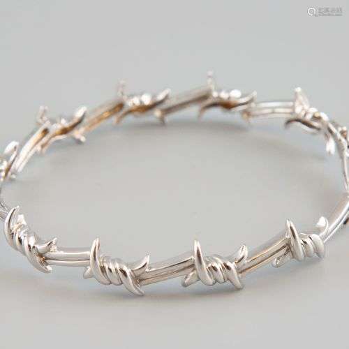 DJULA. Bracelet en or blanc 18K 750°. Poids brut 24g. Signé ...