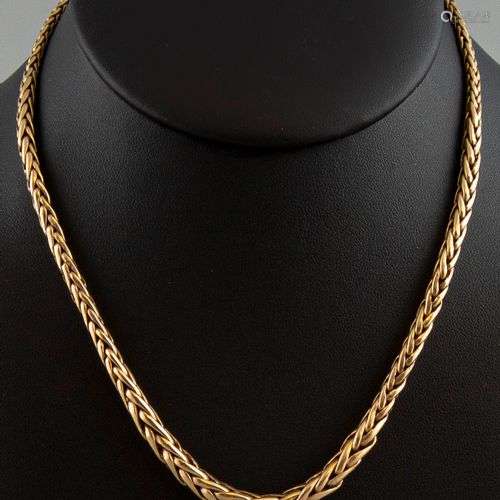 Collier en or jaune 18K 750°, maille palmier. Poids 41,2g.