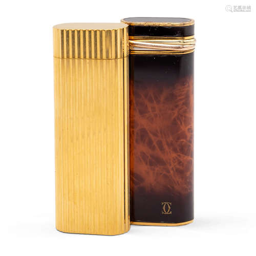 Cartier, two lighters France, 20th century h. 7 cm