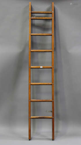 A mid-20th century stained pine step ladder, height 253cm, w...