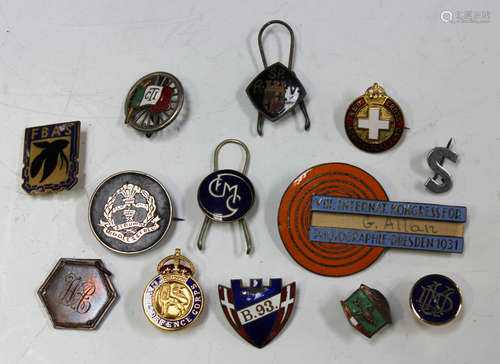 A group of Royal Engineers insignia, including badges and bu...