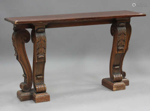 A 20th century Italianate stained pine console table, raised...