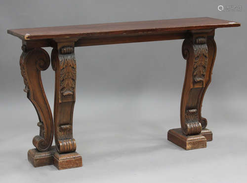 A 20th century Italianate stained pine console table, raised...