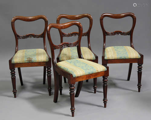 A set of four William IV mahogany spoon back dining chairs, ...