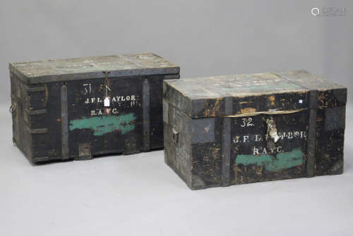 Two painted wooden and metal-bound military trunks, both tin...
