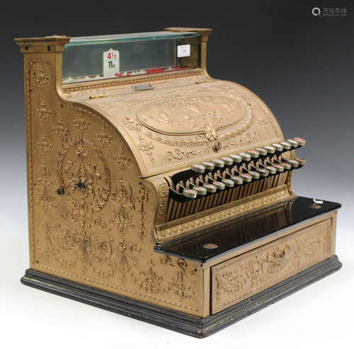 An early 20th century gilt painted cast metal National cash ...