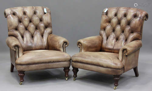 A pair of modern buttoned brown leather armchairs by Fleming...