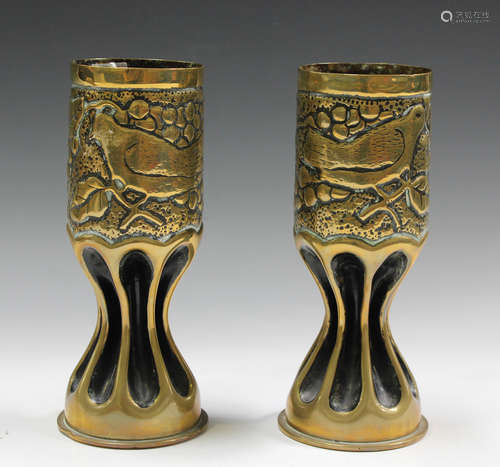 A pair of First World War period brass shell cases, one deta...