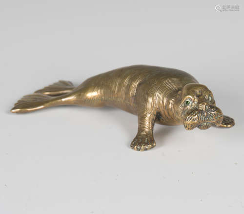 A 19th century cast bronze model of a sea lion, finely cast ...