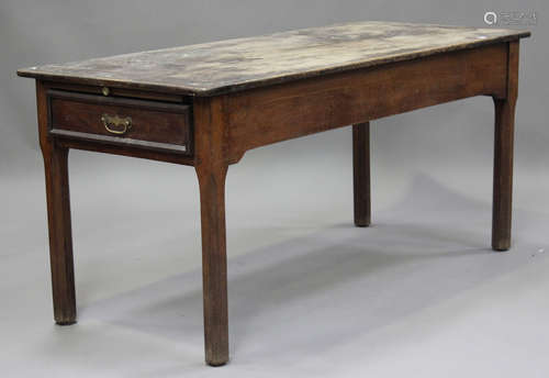 A 19th century provincial oak farmhouse table, each end fitt...